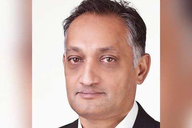 Trinidad political analyst returns home after Suriname court ordered the return of his passports