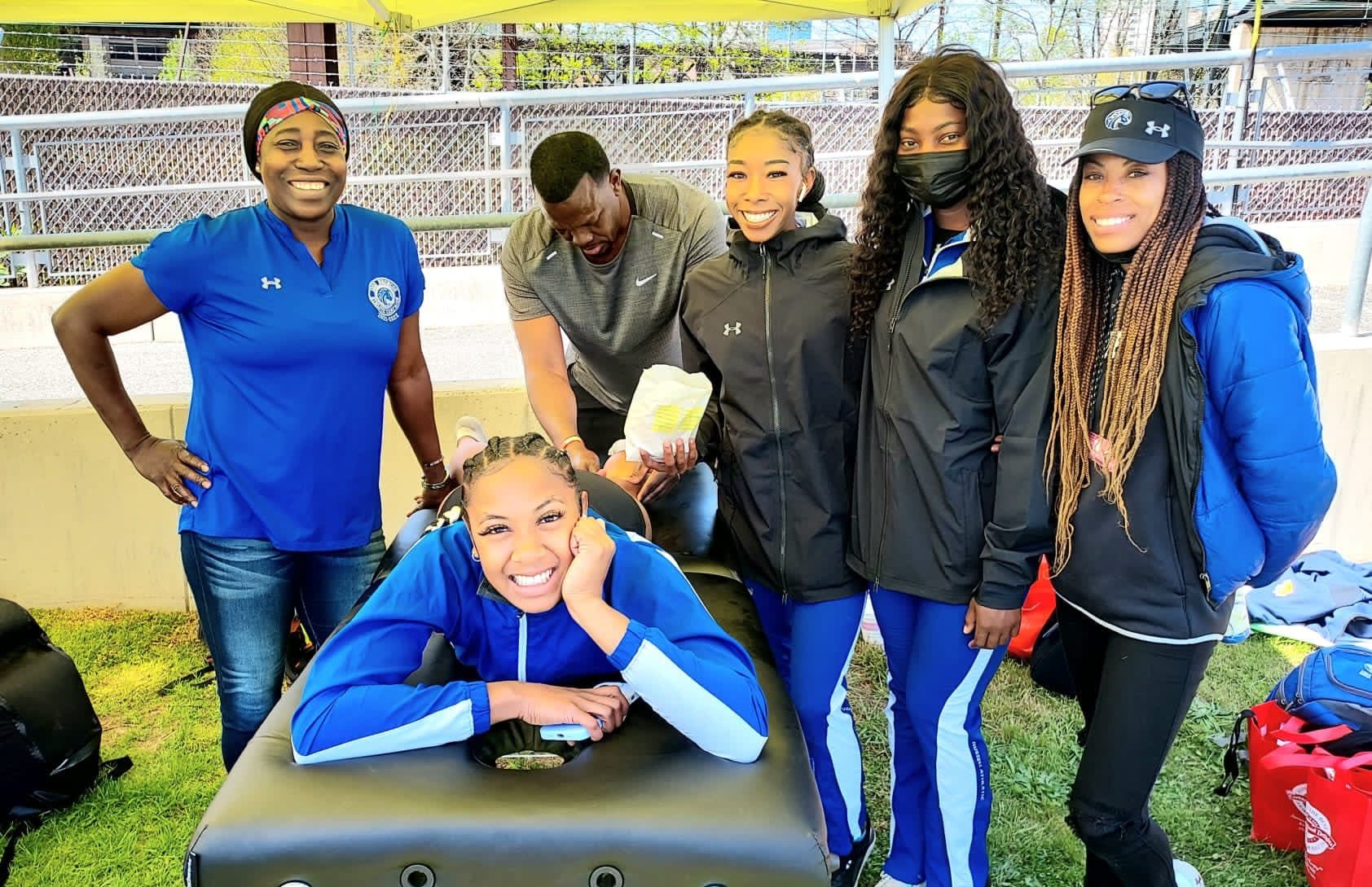5-time Penn Relays wall of famer Inez Turner poses with her team
