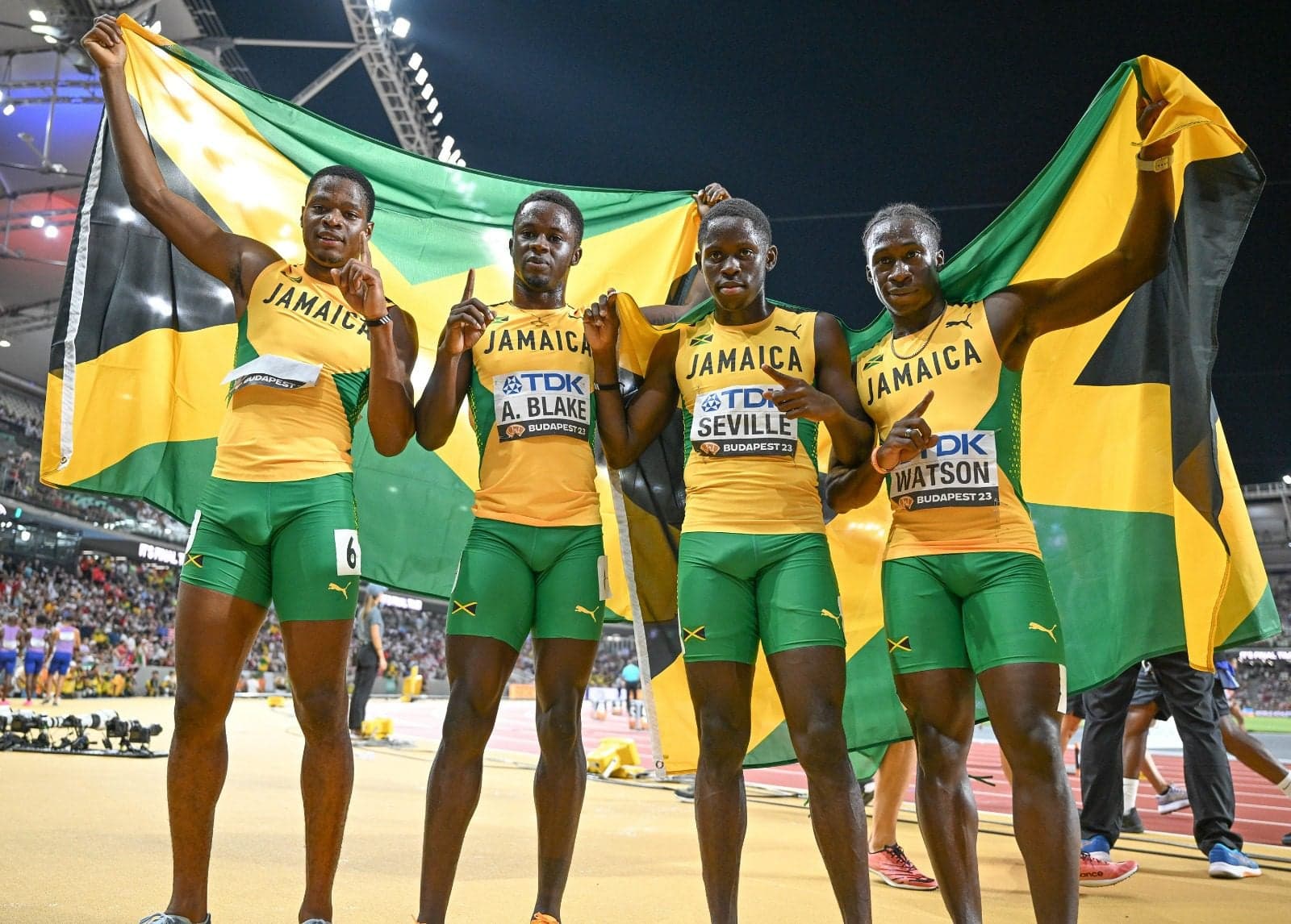 Hurt Fraser-Pryce helps Jamaica cop silver in relay... Mens team claims bronze as Jamaica reaches 11 medals
