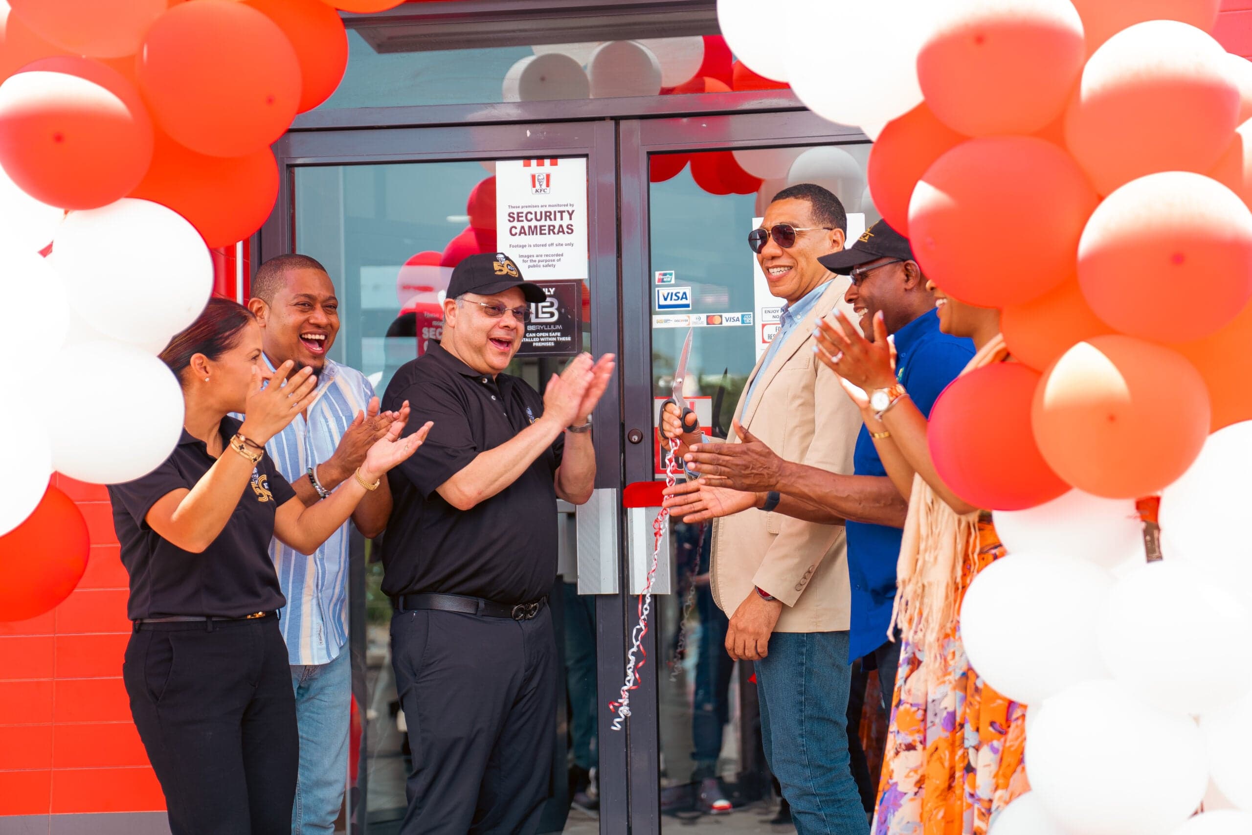 Prime Minister Holness celebrates KFC’s 42nd location in Jamaica