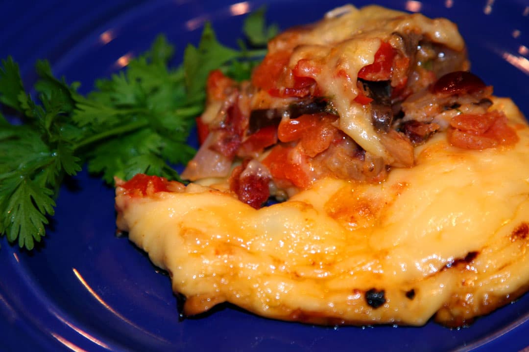 CUISINE: Keshi yena (stuffed cheese)