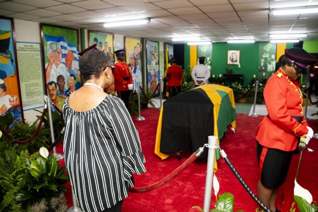 Seaga's body lies-in-state, but some not pleased with closed casket format