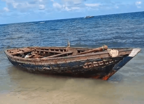 Police arrest 21 Haitians after canoe lands in Portland