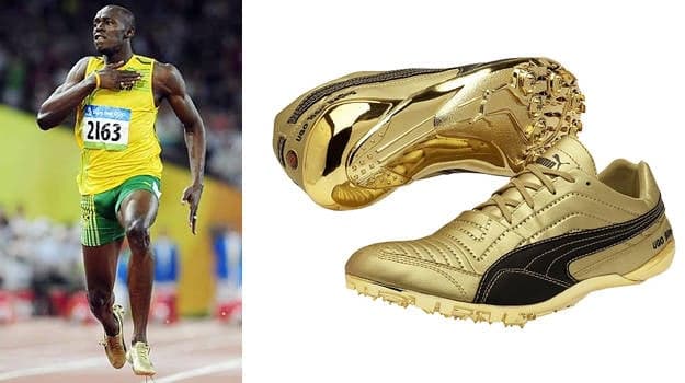 Bolt donates world record breaking limited edition Puma spikes to charity