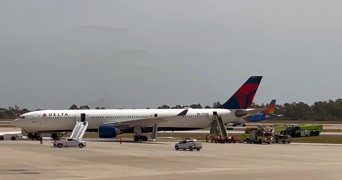 Delta plane engine catches fire at Orlando airport