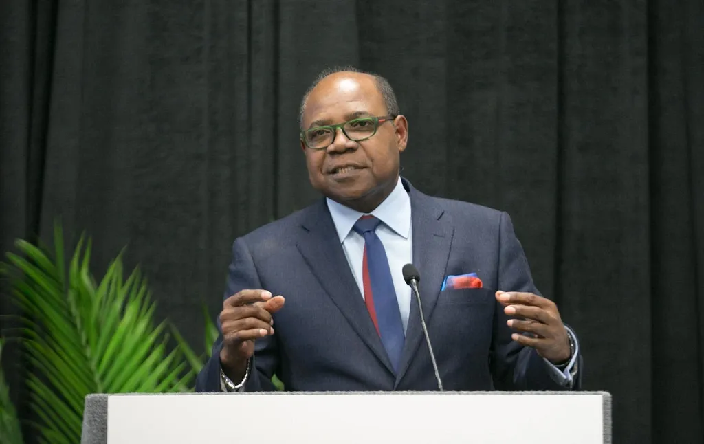 St. Thomas University hosts Jamaica’s Tourism Minister Edmund Bartlett for book signing