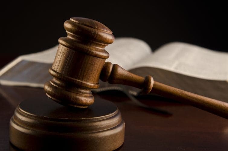 Haitian-American national charged with murder and attempted murder in Belize