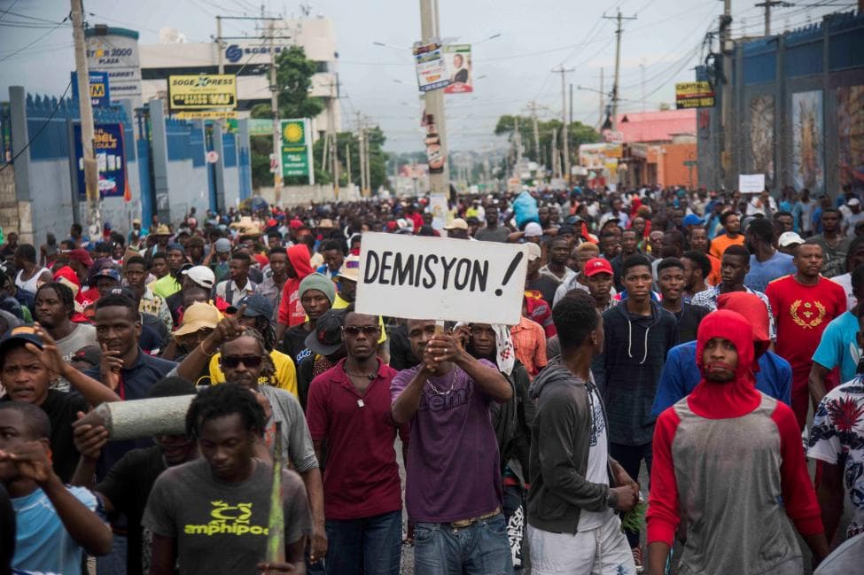 Violence Resumes in Haiti As Protesters Set Bank on Fire
