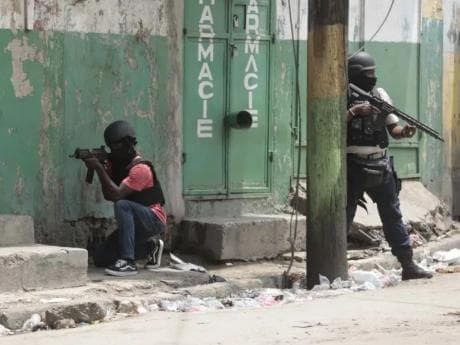 Official: Suspected gang members kill Haitian policeman amid spike in violence