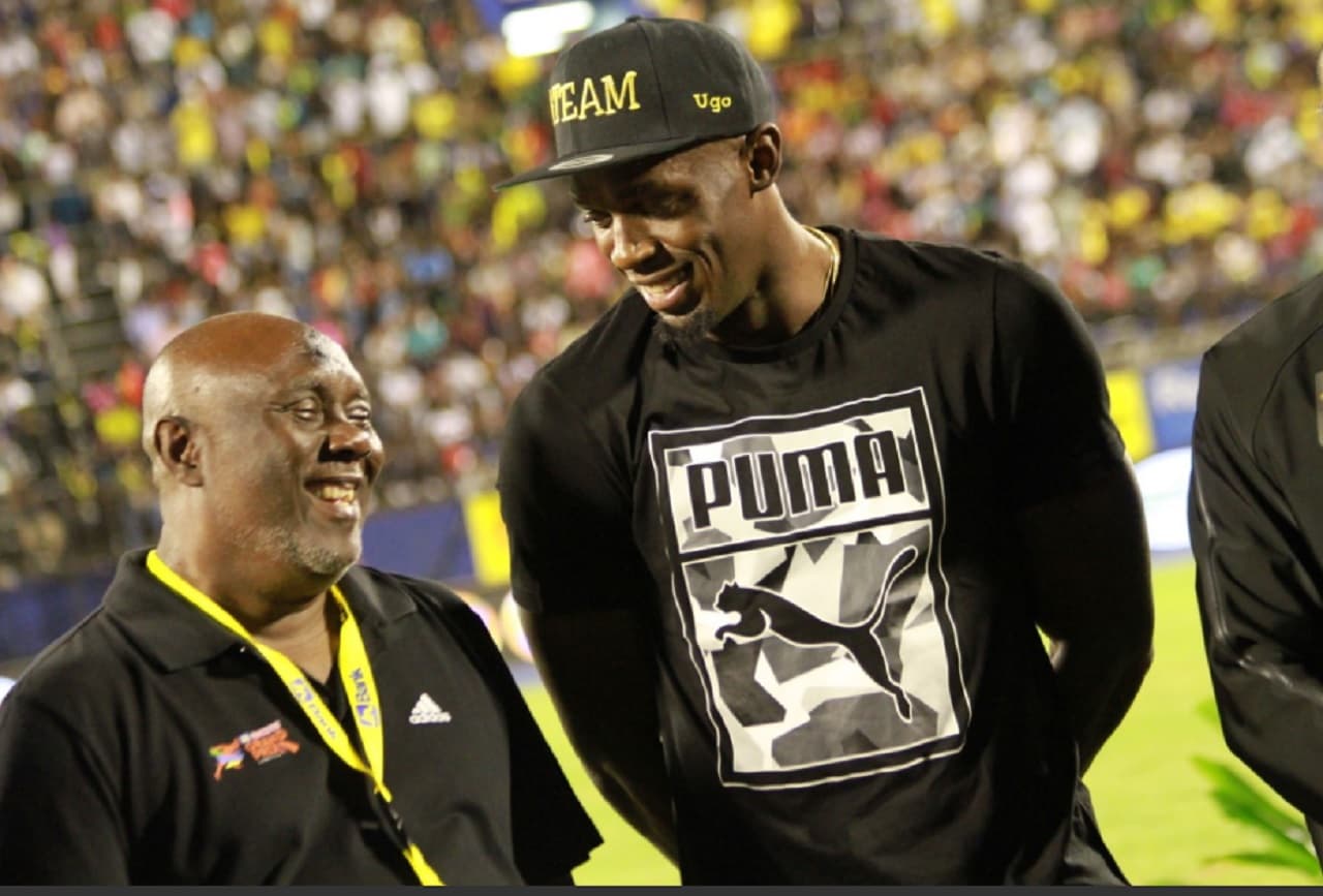 Racers Club Squabble; Bolt Defends Coach Mills Amid Allegations of Neglect
