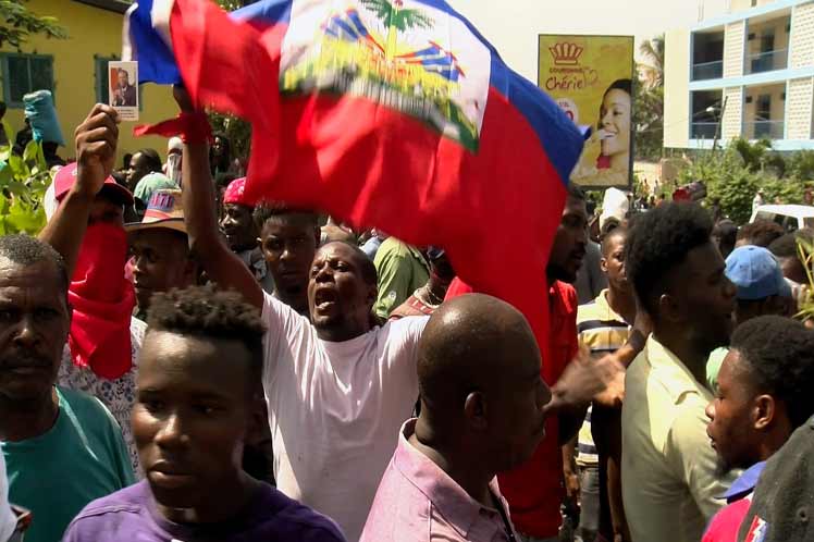 Haitian Government Warns Protesters Against Attacks on Tourist Sites