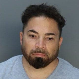 Miami-Dade police officer arrested, accused of molesting children