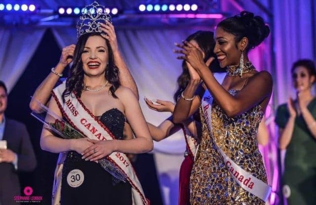 Another Haitian beauty scores