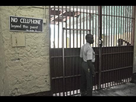 Prison staff, inmates charged in Jamaican crackdown
