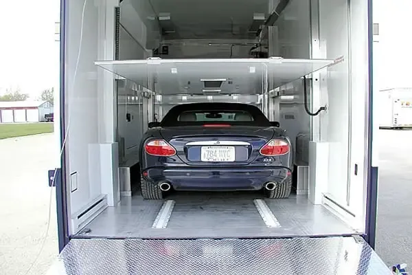 How enclosed carriers protect vehicles during long trips