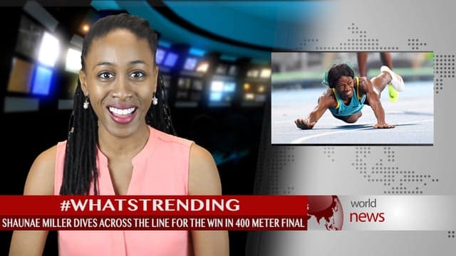 Shaunae Miller 'dives' to victory in the Women's 400m