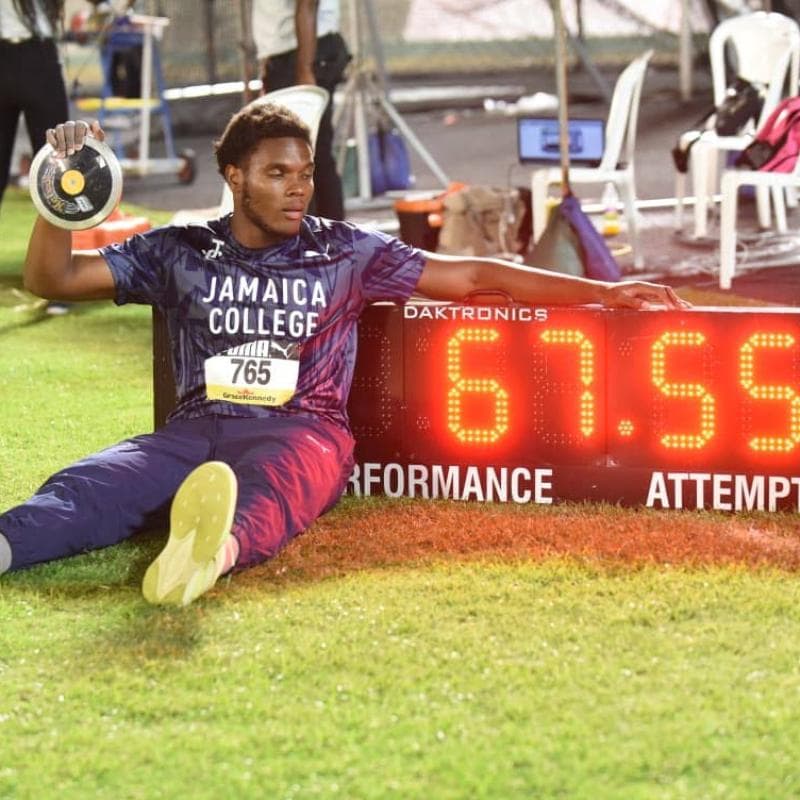 Blue wave builds! Jamaica College seize control while records shatter at Champs