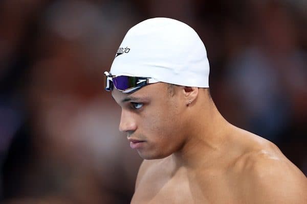Cayman's Jordan Crooks sets blistering pace to reach 50m freestyle semis
