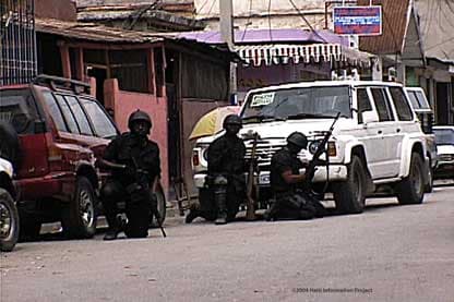 This Day in History: Haiti's Prime Minister Appeals For Help to End Revolt