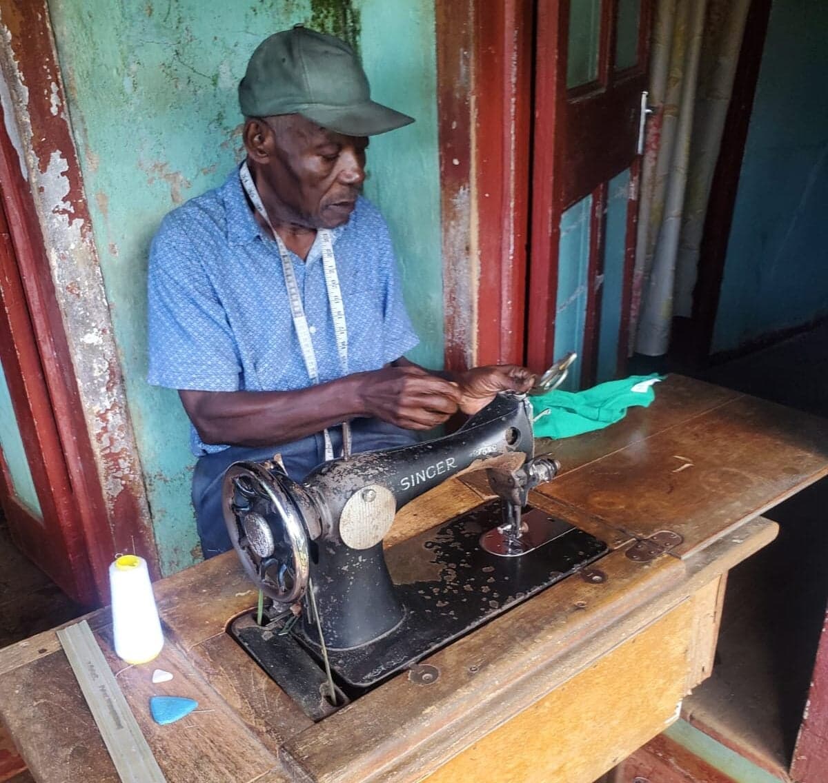 A lifetime of stitches: Tailor Moss keeps craft alive in Jamaica for over 50 years