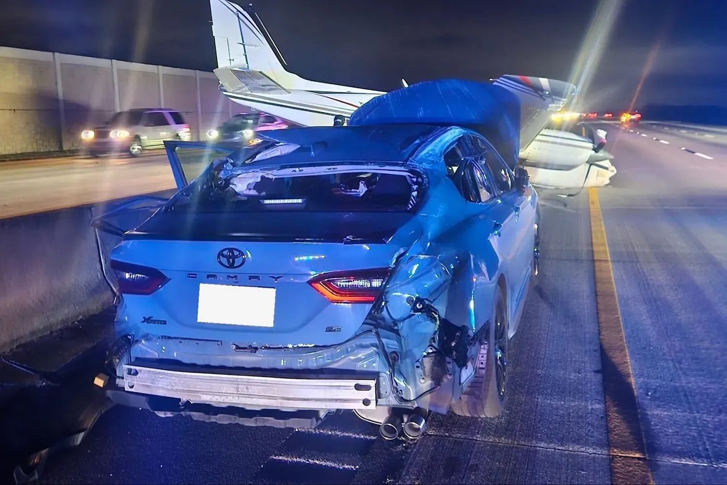 Small plane crash-lands on car during emergency landing on I-95 in Florida