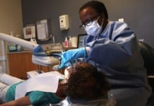 How a cosmetic dentist in Edison can improve confidence and oral health