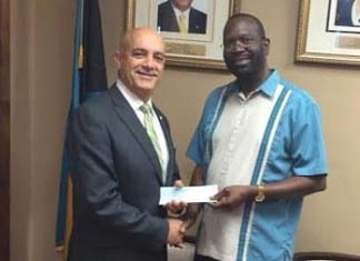 Two local churches donate much needed funds to disaster relief in The Bahamas