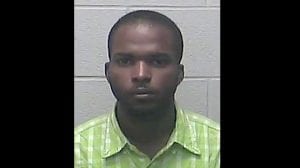 This undated photo provided by Burleigh County Sheriff's Department Detention Center in Bismarck, N.D. shows Lavrick Willocks. Willocks, a Jamaican man accused of being the kingpin of a multimillion-dollar lottery scam that victimized dozens of people across the U.S., pleaded not guilty on Thursday, Jan. 26, 2017, in federal court in North Dakota. He is charged with conspiracy, wire fraud, mail fraud and money laundering. Authorities allege the sophisticated schemes that Willocks masterminded bilked more than 70 mostly elderly Americans out of more than $5.6 million. (Burleigh County Sheriff's Dept Detention Center via AP)