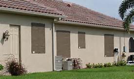 Residents who are riding out Hurricane Irma have boarded up homes to weather the storm - Caribbean National Weekly News