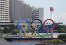 American Gymnast in Olympic Training Camp Tests Positive for COVID-19 olympics ring