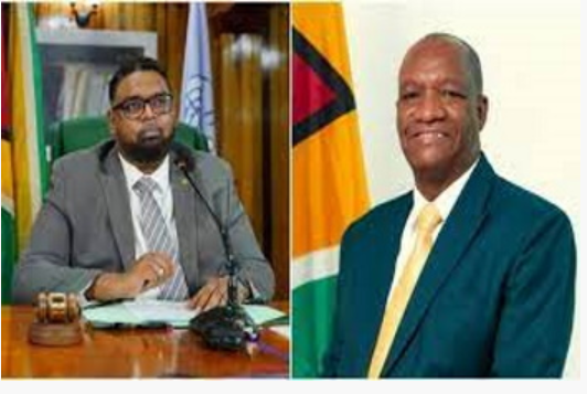 Dr. Irfaan Ali (left) and Opposition leader Joseph Harmon.