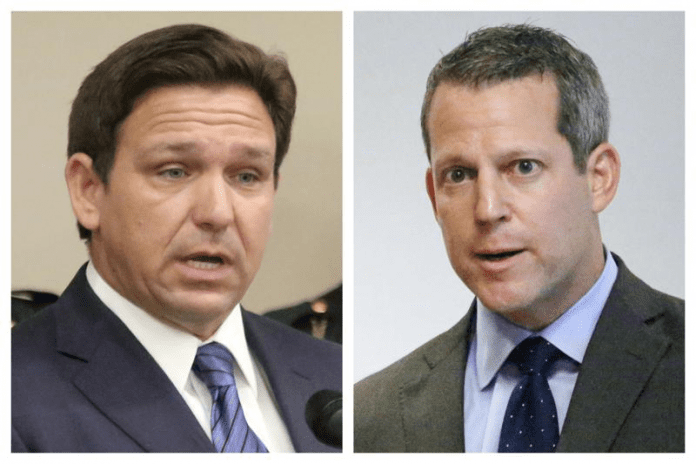 Florida prosecutor Andrew Warren vowed Sunday to fight his suspension from office by Governor Ron DeSantis
