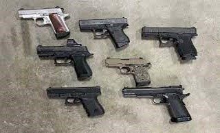 Dominica’s National Security Minister praises police after major illegal firearms bust