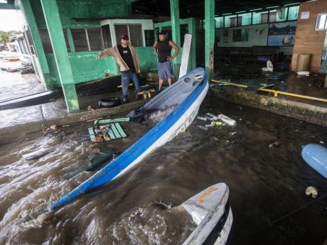 13 dead as Julia drenches Central America with rainfall
