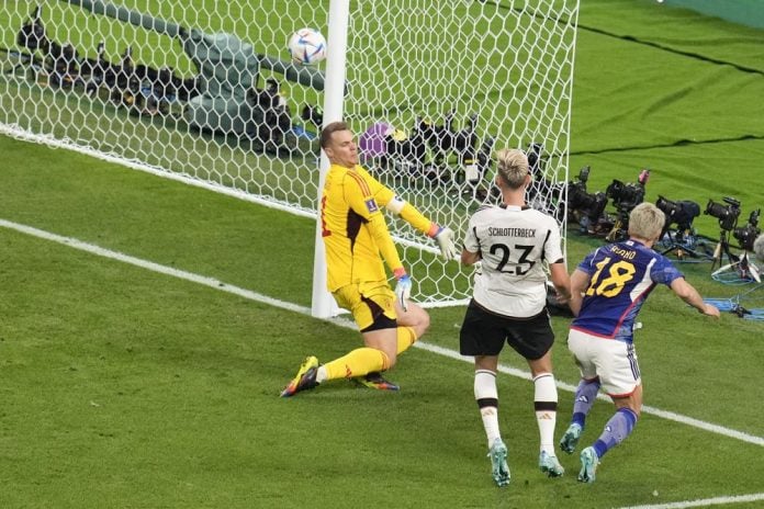 Japan gets 2 late goals to upset Germany 2-1 at World Cup