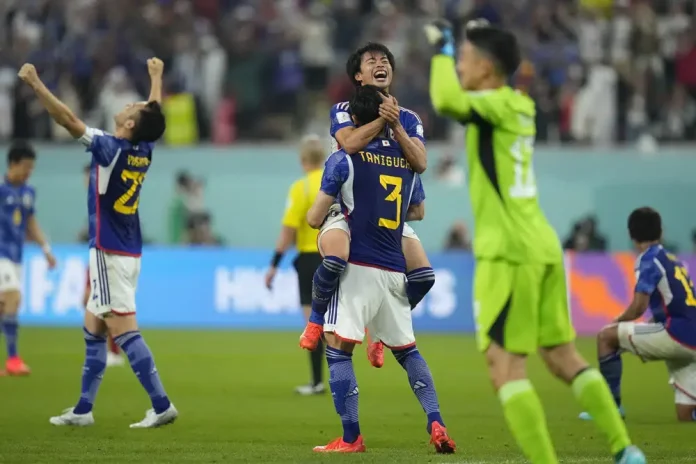 Japan beats Spain 2-1 as both teams advance at World Cup