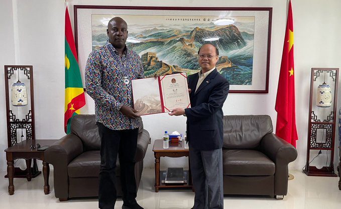 Grenada Cop receives medal from China for protecting citizens in a foreign land