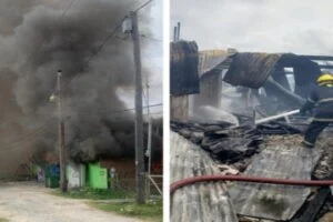 Man dies after rushing back into burning building in search of grandson