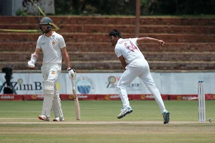 Windies labor to narrow lead after Motie spins out