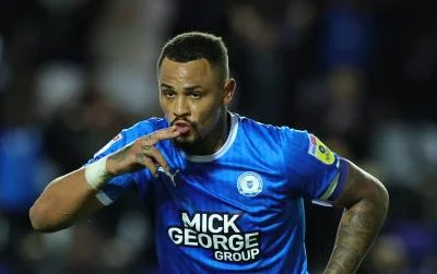 Reggae Boy Clarke-Harris pleased with form as golden boot beckons