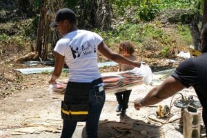 BossMom and Food for the Poor hands over 5th home