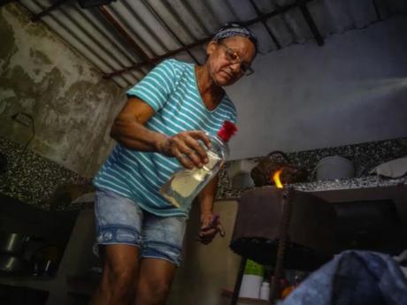 Charcoal cooking, week-long queues for gasoline: Fuel shortages slam Cuba’s countryside