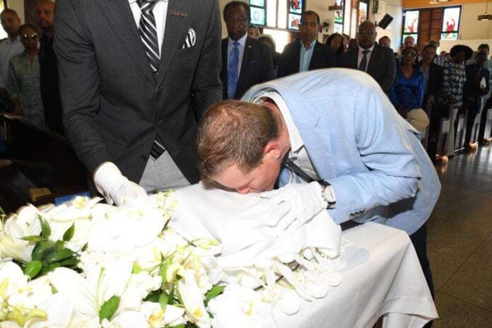 Adam Stewart at his wife's thanksgiving service