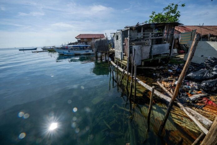 A house destroyed by the sea on the island of Carti Sugdupu.
