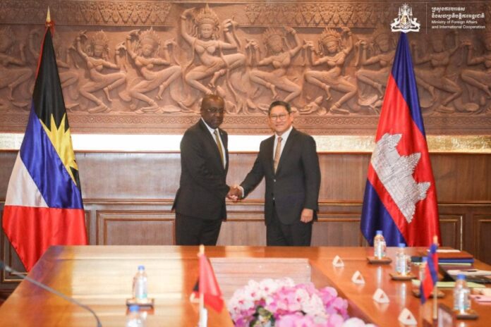 Antigua and Barbuda’s Minister of Foreign Affairs E. P. Chet Greene (left) and Cambodia’s Deputy Prime Minister SOK Chenda Sophea.
