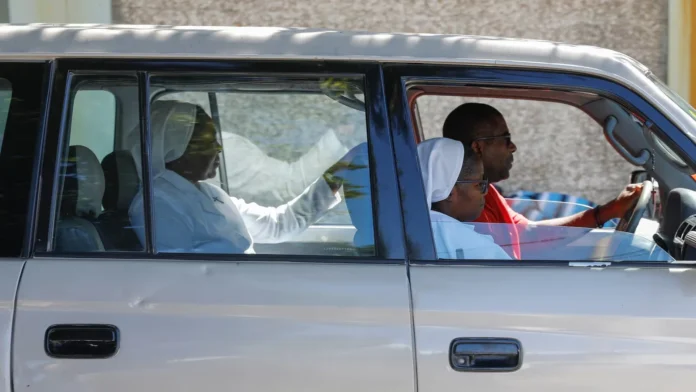 Two of six Catholic nuns who were kidnapped by gangs drive to a hospital the day after being released in Port-au-Prince, Haiti, Thursday, Jan. 25, 2024. Six nuns kidnapped in Haiti last week along with two other people have been released, according to the archbishop of Port-au-Prince.