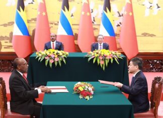 Antigua and Barbuda solidifies ties with China through multiple agreements Minister for Health, Wellness, Social Transformation and the Environment, Sir Molwyn Joseph (left) signs an MOU with a representative from Alibaba Damo Academy and Hospitals.