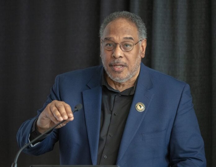 Dr John Flateau.