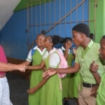 Justice minister encourages students to embrace peaceful conflict resolution