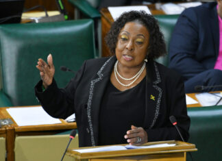 Minister Grange urges compassion as Government backs World Athletics decision
